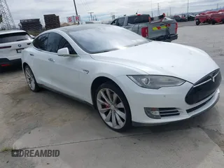 2014 Tesla Model S P85D with VIN 5YJSA1H28EFP69162, listed as a IAAI auction lot 41658356 with 93,254 mi miles and . Bid and sale history available at DreamBid. Image 1.