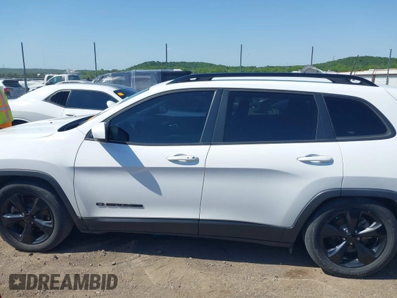 2019 Jeep Cherokee Latitude Plus with VIN 1C4PJLLB0KD339282, listed as a IAAI auction lot 42231050 with 115,901 mi miles and . Bid and sale history available at DreamBid. Image 14.