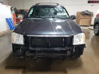 2005 GMC Envoy SLT z VIN 1GKET16M156182328, wystawiony jako Copart lot #52248895 z przebiegiem 199 266 mil mil oraz Szkoda całkowita • Salvage title. Historia ofert i sprzedaży dostępna na DreamBid. Obrazek 5.