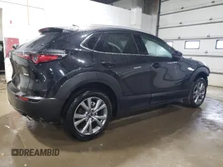 2024 Mazda CX-30 S Premium with VIN 3MVDMBDMXRM674650, listed as a Copart auction lot 54231405 with 7,428 mi miles and Non repairable. Bid and sale history available at DreamBid. Image 3.