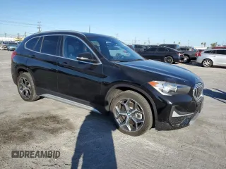2021 BMW X1 sDrive28i with VIN WBXJG7C03M5T10112, listed as a Copart auction lot 49386695 with 46,869 mi miles and Salvage Title. Bid and sale history available at DreamBid. Image 4.