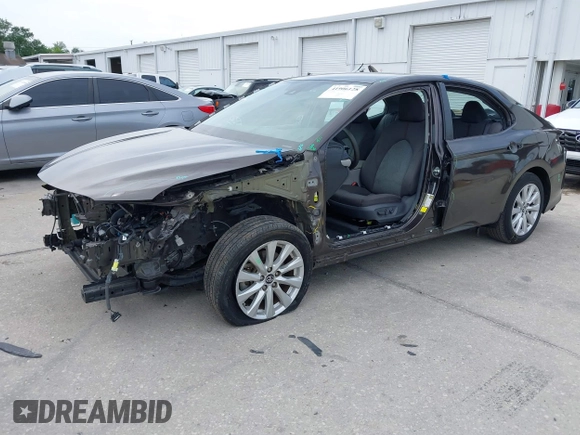 2019 Toyota Camry LE with VIN 4T1B11HKXKU818442, listed as a IAAI auction lot 41906128 with 30,728 mi miles and . Bid and sale history available at DreamBid. Image 18.