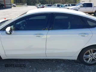 2018 Ford Fusion SE z VIN 3FA6P0H77JR142828, wystawiony jako IAAI lot #41820649 z przebiegiem 208 517 mil mil oraz . Historia ofert i sprzedaży dostępna na DreamBid. Obrazek 14.