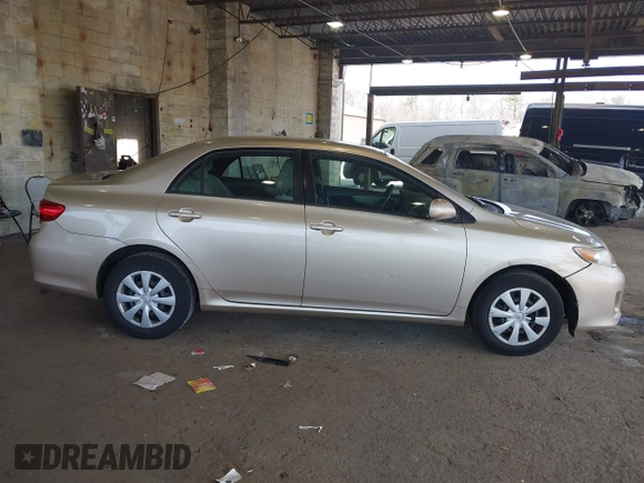 2011 Toyota Corolla L with VIN 2T1BU4EE3BC543537, listed as a IAAI auction lot 41906173 with 182,663 mi miles. Bid and sale history available at carsss.com. Image 14.
