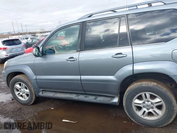 2003 Lexus GX with VIN JTJBT20X830006106, listed as a IAAI auction lot 41520749 with 264,413 mi miles. Bid and sale history available at carsss.com. Image 14.