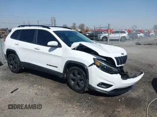 2021 Jeep Cherokee Altitude with VIN 1C4PJLLB1MD180422, listed as a IAAI auction lot 41830952 with 73,839 mi miles. Bid and sale history available at carsss.com. Image 1.