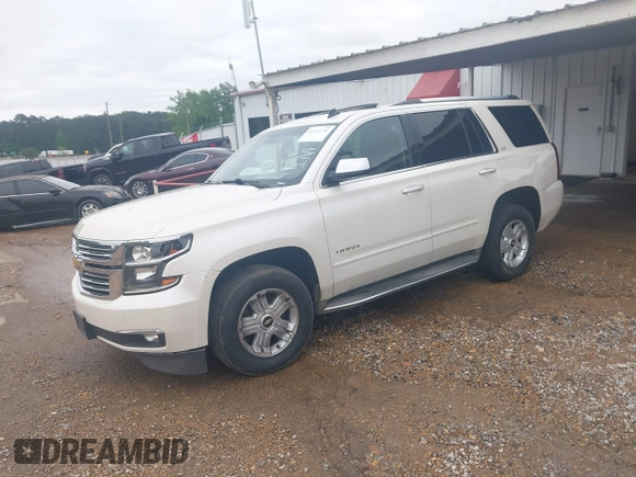 2015 Chevrolet Tahoe LTZ with VIN 1GNSCCKC1FR265370, listed as a IAAI auction lot 42131294 with 217,064 mi miles and . Bid and sale history available at DreamBid. Image 19.