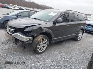 2017 Dodge Journey SXT with VIN 3C4PDCBBXHT683682, listed as a IAAI auction lot 41501427 with 141,299 mi miles and . Bid and sale history available at DreamBid. Image 2.