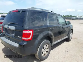 2011 Ford Escape Limited with VIN 1FMCU0EG9BKC66966, listed as a IAAI auction lot 42627832 with 154,101 mi miles and . Bid and sale history available at DreamBid. Image 4.