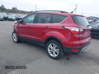 2018 Ford Escape SE z VIN 1FMCU9GD8JUB14803, wystawiony jako IAAI lot #41842056 z przebiegiem 50 712 mil mil oraz . Historia ofert i sprzedaży dostępna na DreamBid. Obrazek 3.