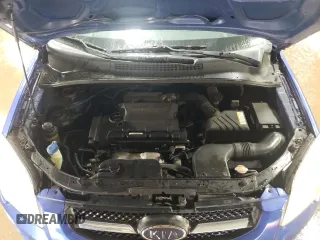 2009 Kia Sportage LX with VIN KNDJF724197557676, listed as a Copart auction lot 51774565 with 172,768 mi miles and Salvage Title. Bid and sale history available at carsss.com. Image 11.