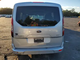 2014 Ford Transit Connect XLT с VIN NM0AE8F7XE1149510, выставлен на аукционе Copart как лот 82015004 с пробегом 75 499 миль миль и Списание • Salvage title. История ставок и продаж доступна на DreamBid. Изображение 6.