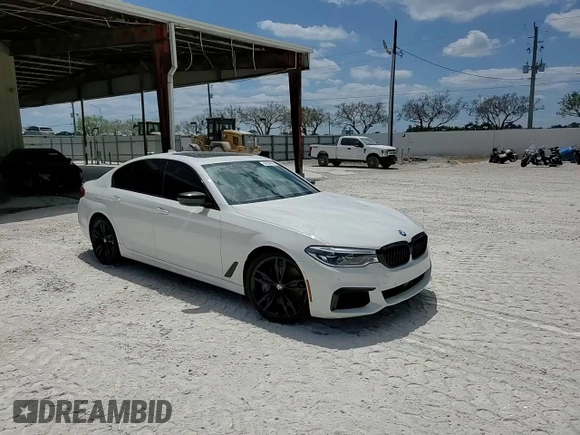 2020 BMW 5 Series M550i xDrive z VIN WBAJS7C07LBN96328, wystawiony jako Copart lot #52234045 z przebiegiem 46 515 mil mil oraz Nie do naprawy • Non repairable. Historia ofert i sprzedaży dostępna na DreamBid. Obrazek 14.