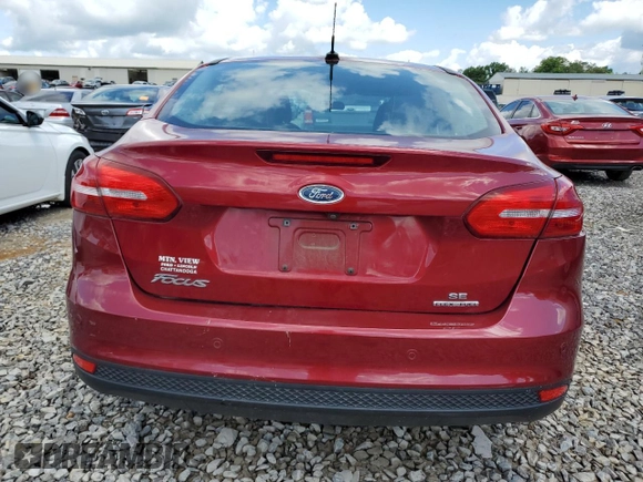 2016 Ford Focus SE z VIN 1FADP3F22GL355192, wystawiony jako Copart lot #56614225 z przebiegiem 56 214 mil mil oraz Szkoda całkowita • Salvage title. Historia ofert i sprzedaży dostępna na DreamBid. Obrazek 6.