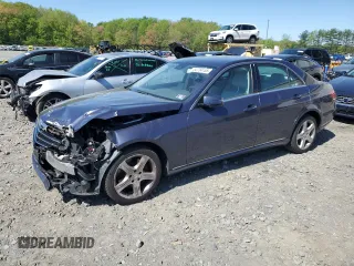 2014 Mercedes-Benz E 350 Luxury with VIN WDDHF8JB0EA922470, listed as a Copart auction lot 54734155 with 137,999 mi miles and Salvage Title. Bid and sale history available at DreamBid. Image 1.