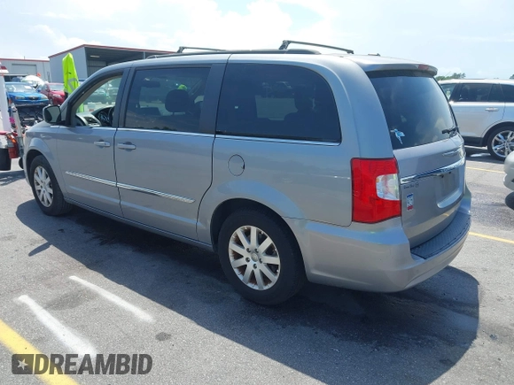 2014 Chrysler Town & Country Touring with VIN 2C4RC1BG7ER271455, listed as a IAAI auction lot 42102571 with 140,578 mi miles. Bid and sale history available at carsss.com. Image 3.