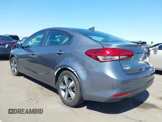 2018 Kia Forte LX with VIN 3KPFL4A77JE220538, listed as a IAAI auction lot 42095964 with 98,977 mi miles and . Bid and sale history available at DreamBid. Image 3.