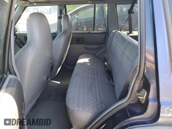1997 Jeep Cherokee Sport with VIN 1J4FJ68S1VL543468, listed as a Copart auction lot 72753854 with 0 mi miles and Salvage Title. Bid and sale history available at carsss.com. Image 11.
