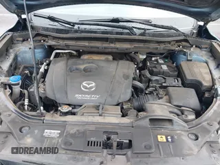 2015 Mazda CX-5 Sport with VIN JM3KE4BY0F0507727, listed as a IAAI auction lot 41249151 with 95,343 mi miles. Bid and sale history available at carsss.com. Image 10.