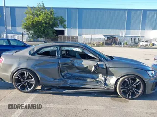 2023 Audi S5 Premium Plus with VIN WAUP4AF58PA001748, listed as a IAAI auction lot 41194878 with 33,877 mi miles and . Bid and sale history available at DreamBid. Image 13.