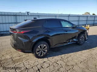 2023 Lexus RZ with VIN JTJAAAAB6PA022223, listed as a Copart auction lot 70585764 with 0 mi miles and Salvage Title. Bid and sale history available at carsss.com. Image 3.