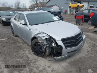 2009 Cadillac CTS AWD with VIN 1G6DS57VX90150367, listed as a IAAI auction lot 41487942 with 102,043 mi miles and . Bid and sale history available at DreamBid. Image 1.