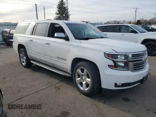 2015 Chevrolet Suburban LTZ with VIN 1GNSKKKC1FR275393, listed as a Copart auction lot 48349675 with 158,542 mi miles and Salvage Title. Bid and sale history available at carsss.com. Image 4.