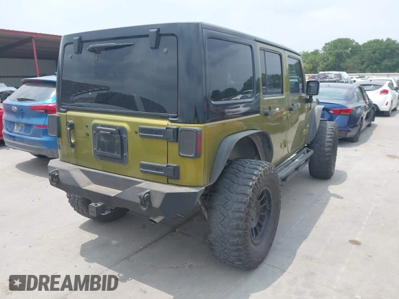2008 Jeep Wrangler Unlimited Sahara with VIN 1J8GA59108L574959, listed as a IAAI auction lot 42171011 with Not Provided miles and . Bid and sale history available at carsss.com. Image 4.