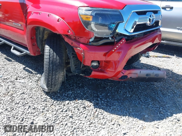 2014 Toyota Tacoma with VIN 5TFLU4EN4EX095917, listed as a IAAI auction lot 41820691 with 59,823 mi miles and . Bid and sale history available at DreamBid. Image 6.