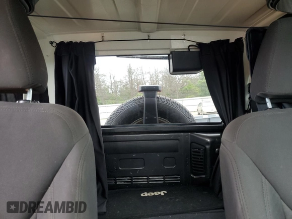 2017 Jeep Wrangler Sport with VIN 1C4GJWAG8HL608093, listed as a Copart auction lot 65006675 with 52,630 mi miles and Salvage title. Bid and sale history available at DreamBid. Image 10.