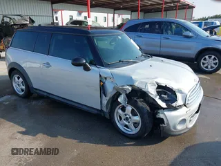 2011 MINI Clubman with VIN WMWZF3C59BT188367, listed as a IAAI auction lot 40755351 with 122,023 mi miles and . Bid and sale history available at DreamBid. Image 1.