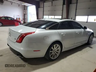 2016 Jaguar XJ R-Sport with VIN SAJWJ1CDXG8W00145, listed as a Copart auction lot 49901234 with 76,629 mi miles and . Bid and sale history available at DreamBid. Image 3.