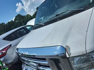 2014 Ford Econoline Cargo Commercial with VIN 1FTNE2EW0EDA53278, listed as a IAAI auction lot 42854412 with 188,803 mi miles and . Bid and sale history available at DreamBid. Image 26.
