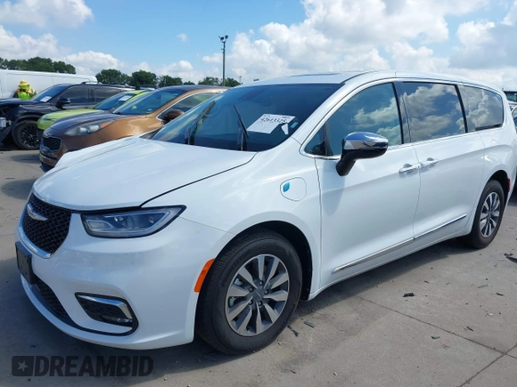 2023 Chrysler Pacifica Hybrid Limited with VIN 2C4RC1S75PR559106, listed as a IAAI auction lot 42613325 with 62,749 mi miles and . Bid and sale history available at DreamBid. Image 16.