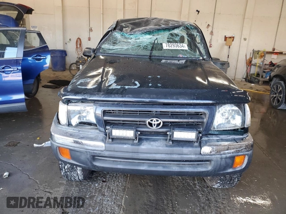 1999 Toyota Tacoma with VIN 4TAPM62N9XZ555738, listed as a Copart auction lot 78293634 with 210,096 mi miles and Salvage Title. Bid and sale history available at DreamBid. Image 5.