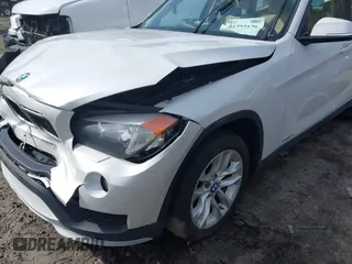 2015 BMW X1 xDrive28i with VIN WBAVL1C59FVY40443, listed as a IAAI auction lot 41777176 with 91,560 mi miles. Bid and sale history available at carsss.com. Image 12.