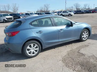2015 Mazda 3 i Sport with VIN 3MZBM1K77FM181663, listed as a IAAI auction lot 41903610 with 200,618 mi miles and . Bid and sale history available at DreamBid. Image 4.