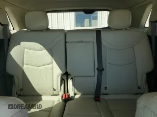 2021 Cadillac XT5 FWD Premium Luxury with VIN 1GYKNCRSXMZ135949, listed as a Copart auction lot 47752805 with 99,838 mi miles and Salvage Title. Bid and sale history available at carsss.com. Image 10.