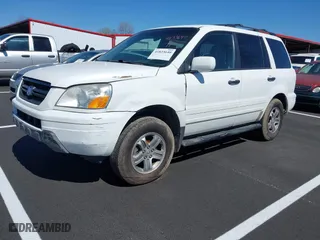 2003 Honda Pilot EX with VIN 2HKYF18693H511343, listed as a IAAI auction lot 41833640 with 300,640 mi miles. Bid and sale history available at carsss.com. Image 2.