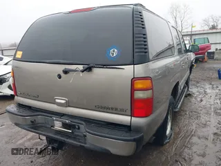 2002 Chevrolet Suburban Z71 with VIN 3GNFK16ZX2G278927, listed as a IAAI auction lot 41457820 with 210,134 mi miles. Bid and sale history available at carsss.com. Image 4.