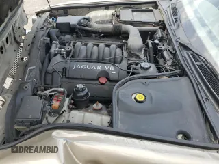 1999 Jaguar XJ z VIN SAJKX6048XC849376, wystawiony jako Copart lot #70538064 z przebiegiem 122 891 mil mil oraz Szkoda całkowita • Salvage title. Historia ofert i sprzedaży dostępna na DreamBid. Obrazek 11.