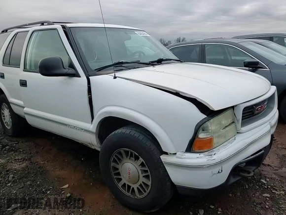 1998 GMC Jimmy SLS with VIN 1GKDT13W9W2506846, listed as a Copart auction lot 84854964 with 151,051 mi miles and Salvage Title. Bid and sale history available at carsss.com. Image 10.
