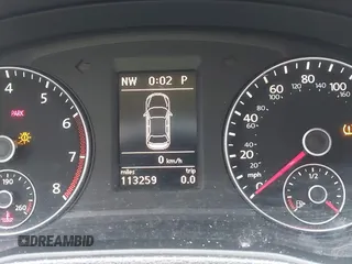 2012 Volkswagen Passat SE with VIN 1VWBH7A36CC077412, listed as a IAAI auction lot 41651796 with 113,259 mi miles and . Bid and sale history available at DreamBid. Image 7.