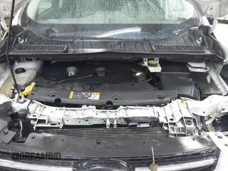 2014 Ford Escape Titanium with VIN 1FMCU9J90EUD21552, listed as a IAAI auction lot 42102148 with 183,539 mi miles. Bid and sale history available at carsss.com. Image 10.
