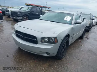 2010 Dodge Charger SXT with VIN 2B3CA3CV0AH250503, listed as a IAAI auction lot 41886316 with 140,390 mi miles. Bid and sale history available at carsss.com. Image 2.