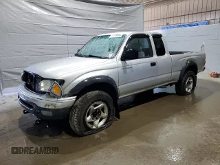2002 Toyota Tacoma z VIN 5TEWN72N92Z121433, wystawiony jako Copart lot #51138955 z przebiegiem 311 098 mil mil oraz Szkoda całkowita • Salvage title. Historia ofert i sprzedaży dostępna na DreamBid. Obrazek 1.