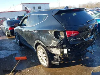 2014 Hyundai Santa Fe Sport with VIN 5XYZWDLA4EG141110, listed as a IAAI auction lot 41265982 with 121,909 mi miles. Bid and sale history available at carsss.com. Image 3.