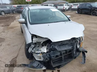2014 Ford Focus SE with VIN 1FADP3K2XEL449744, listed as a IAAI auction lot 41829228 with 103,032 mi miles. Bid and sale history available at carsss.com. Image 1.