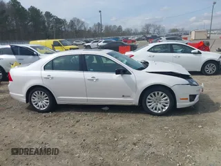 2010 Ford Fusion Hybrid with VIN 3FADP0L33AR392806, listed as a IAAI auction lot 41811194 with 131,627 mi miles. Bid and sale history available at carsss.com. Image 13.