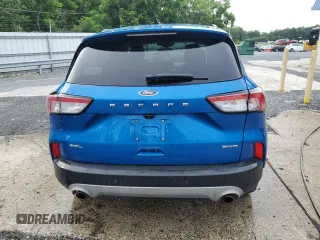 2021 Ford Escape SEL z VIN 1FMCU9H61MUA65237, wystawiony jako Copart lot #65338735 z przebiegiem 92 741 mil mil oraz Czysty tytuł • Clean title. Historia ofert i sprzedaży dostępna na DreamBid. Obrazek 6.